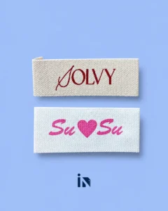 In nhãn cotton JOLVY và SuSu trên nền cotton trắng
