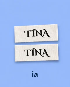 In nhãn cotton TINA màu trắng chữ đen sắc nét